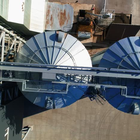 Grain Cooperative. Large aluminum containers for storing loose grain. Aerial view