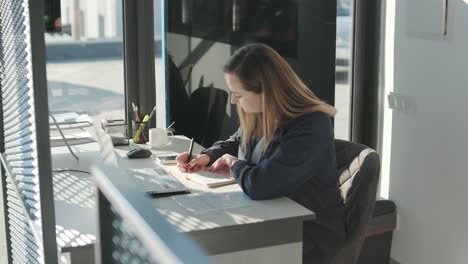 car service manager working at desk in office