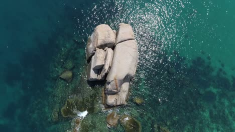 aerial view of rocks in the ocean