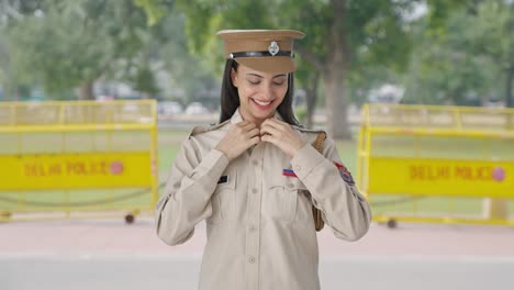 Happy-Indian-female-police-constable-wearing-hat