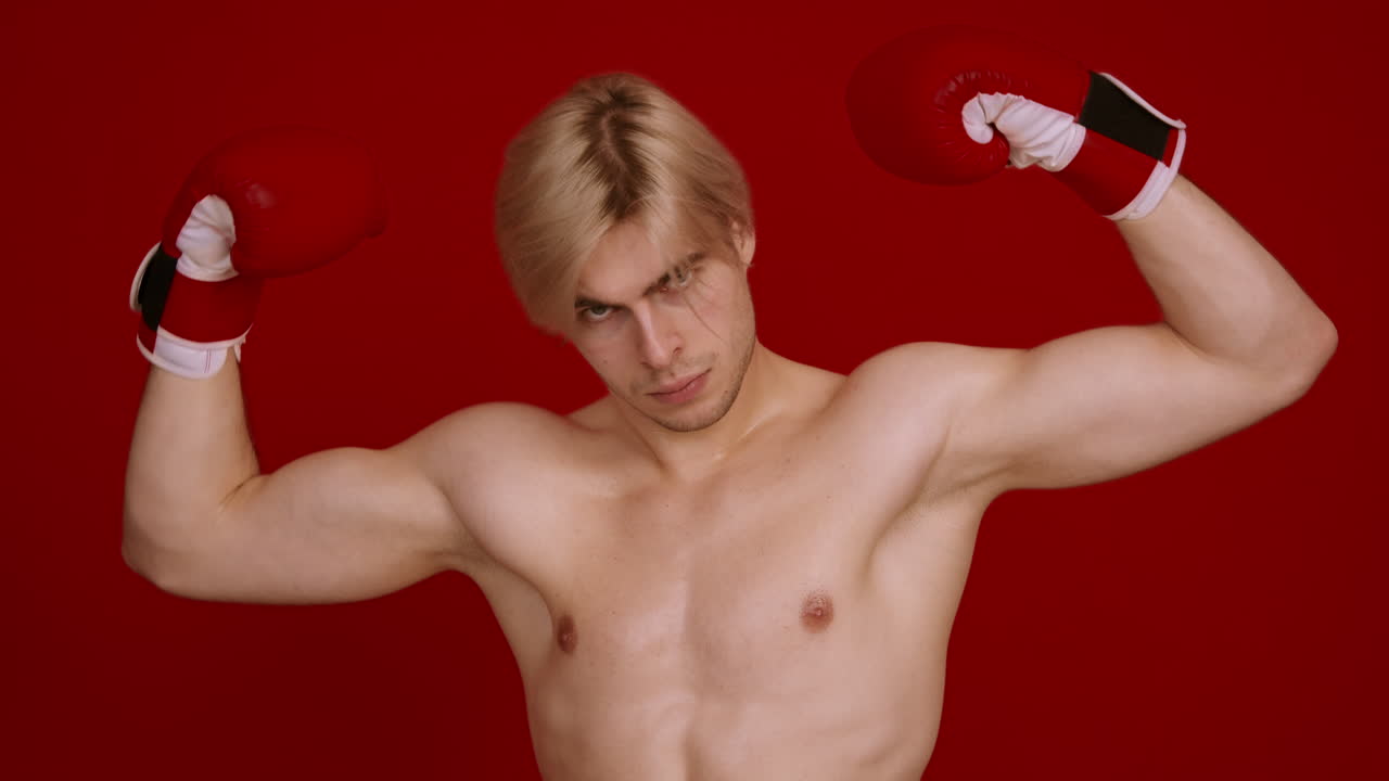 hombre con guantes de boxeo