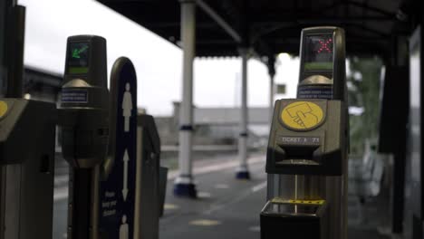 ticket machines in train station medium panning shot