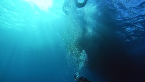 air bubbles caused by divers