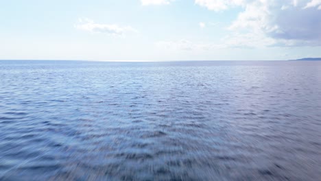 Bright-stunning-sky-on-horizon-above-idyllic-calm-ocean-waters