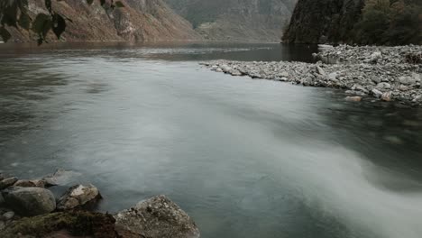 time lapse  video of mountain river meeting aurlandfjord