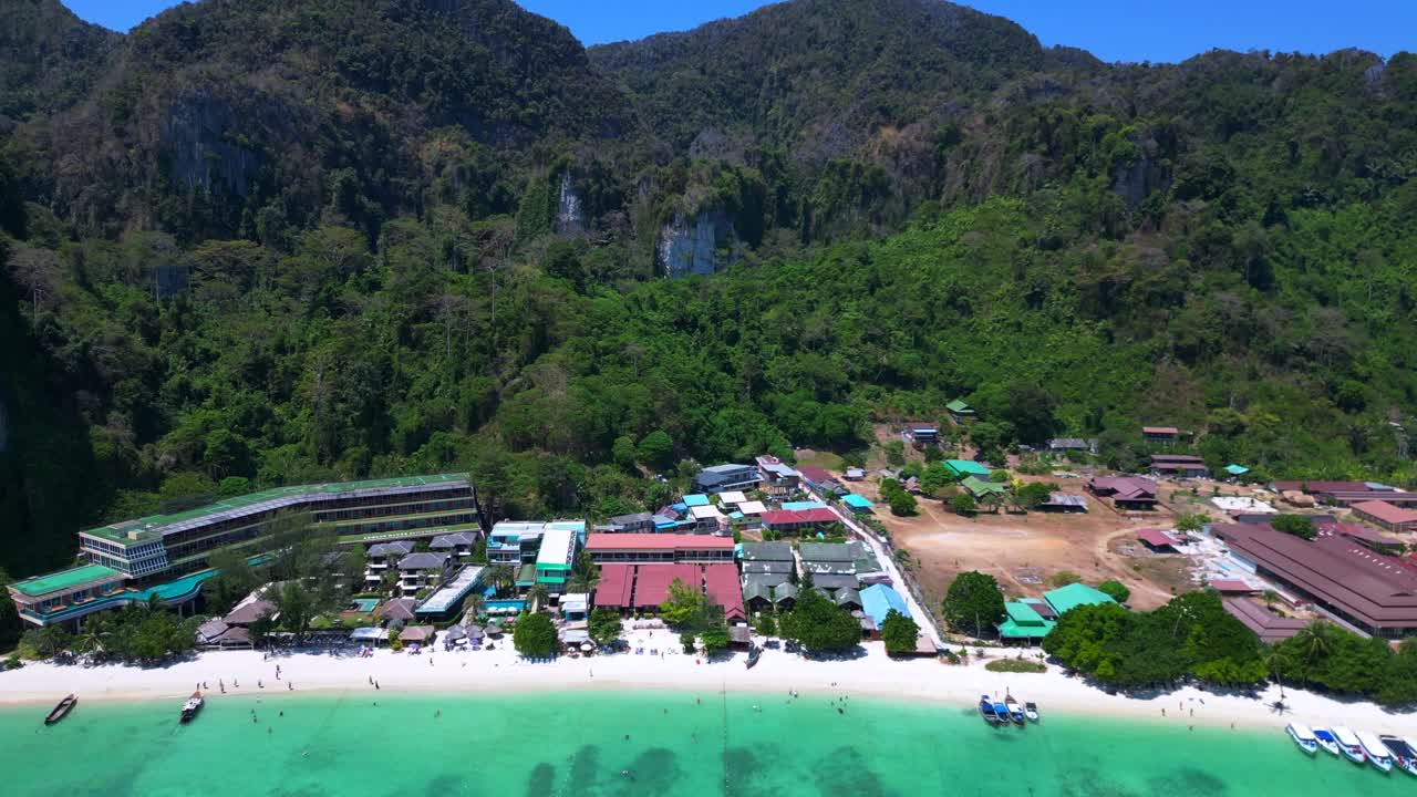 Aerial View of Tropical Beach Resort with Turquoise Water