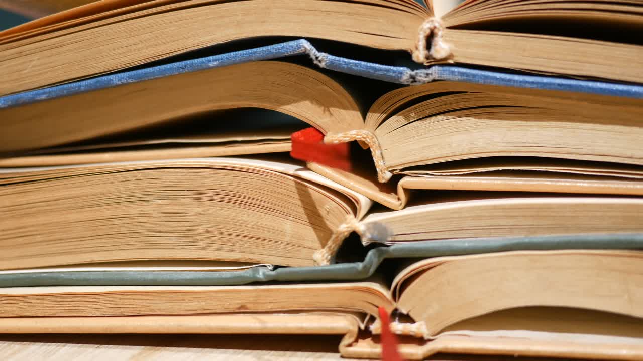 Stack of Old Open Books