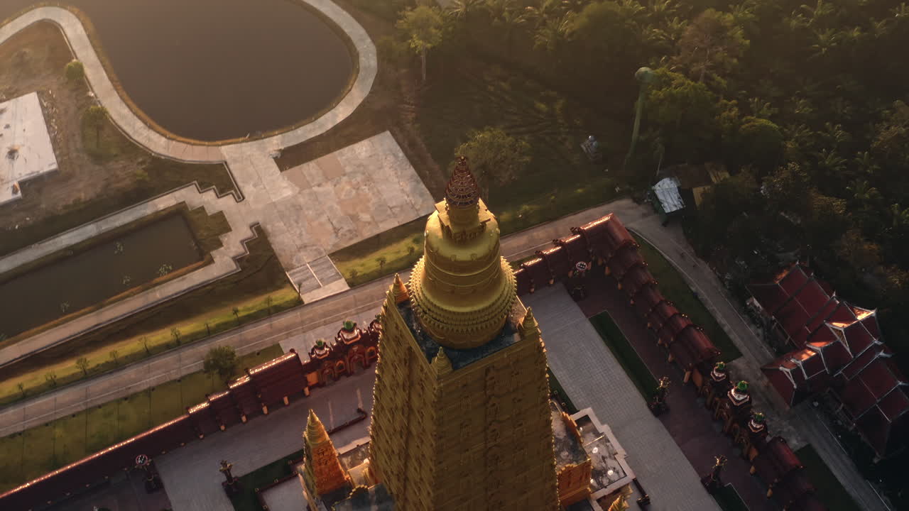 Aerial View of a Golden Pagoda in Southeast Asia