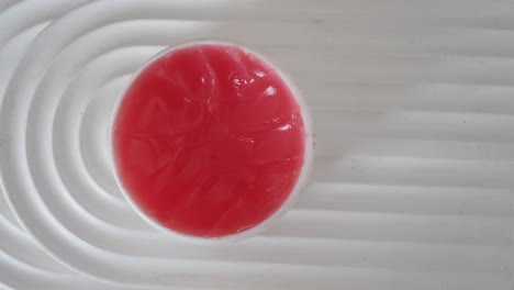 pink gel on wavy white surface
