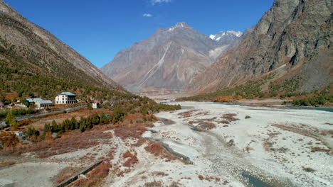 Autumn-aerial-view-of-a-dry-and-sandy-rocky-mountain-valley-from-Asia