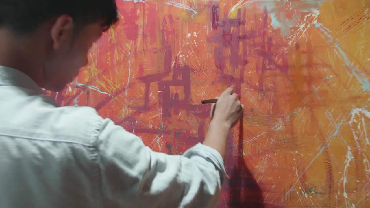Male Artist Painting Abstract Picture