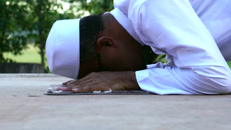 footage: muslim man praying with copy space