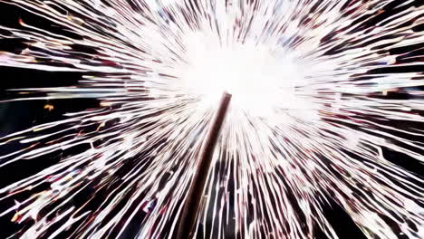 close-up of a sparkler burning in the dark