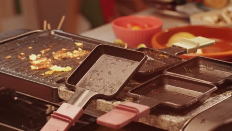 dirty dishes and mess after a party at home close-up. christmas table after the holiday celebrating. cleaning the house after dinner with friends and family. home cleaning services