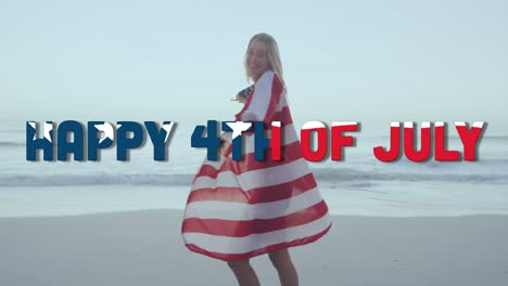 Animación-Del-Feliz-Texto-Del-4-De-Julio-Con-El-Patrón-De-La-Bandera-Estadounidense,-Mujer-Envuelta-En-La-Bandera-De-EE.UU.-En-La-Playa