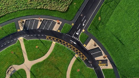 modern circular cemetery pathway design aerial view artistic garden of rest birdseye forwards