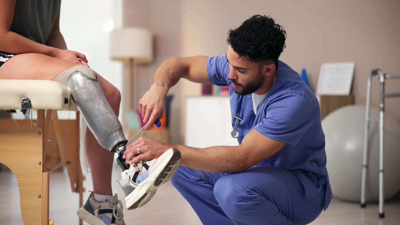 Physical Therapist Adjusting Prosthetic Leg for Patient