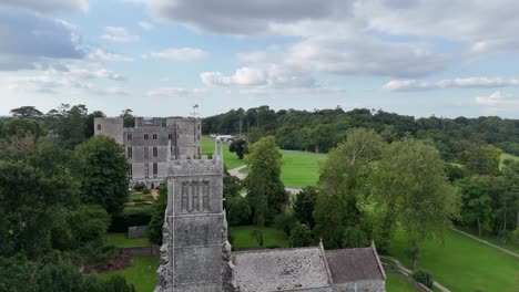 picturesque castle and church in the english countryside
