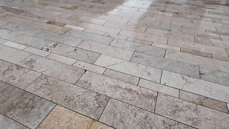 wet stone pavement tiles