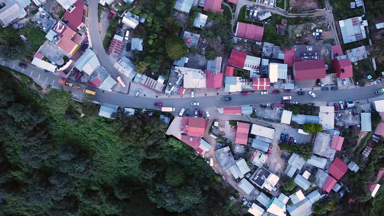 Drone Footage of a Remote Mountain Town Surrounded by Forest in Oaxaca