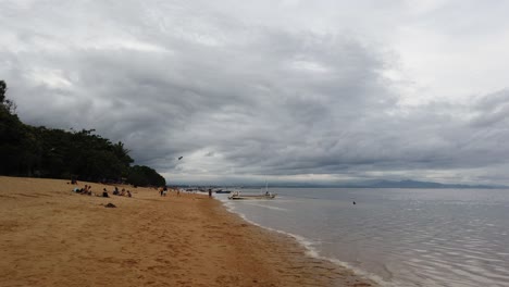 Magnificent-Skylight-in-Sanur,-Bali-Indonesia-White-Sand-Beach,-Kites,-Calm-Sea-Water,-Holiday-Destination-in-the-Island-of-Gods