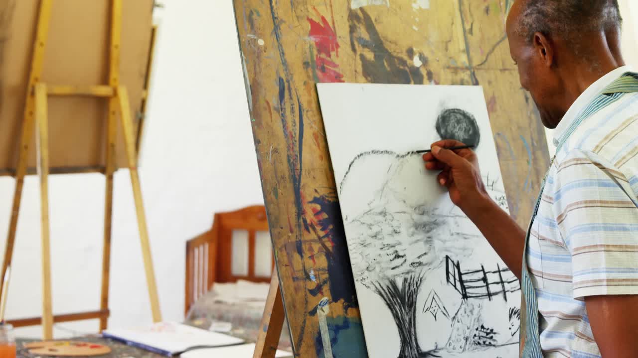 Artist drawing sketch on canvas 4k