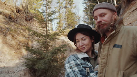 Young-Romantic-Couple-Standing-in-Canyon