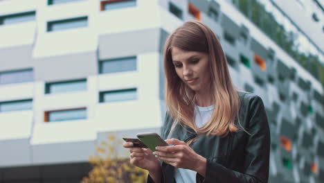 woman using smartphone and credit card
