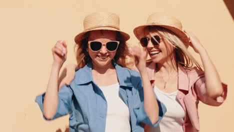 two happy women enjoying a summer day