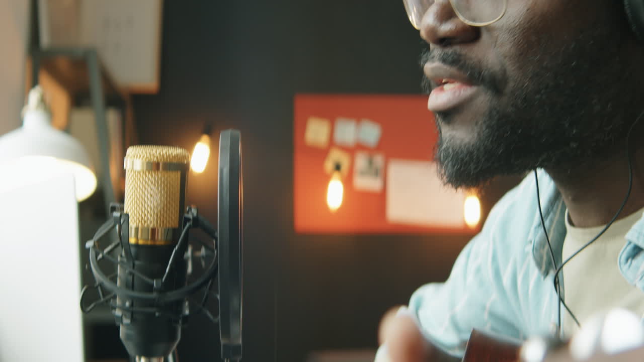 African American Singer Recording Music at Home Studio