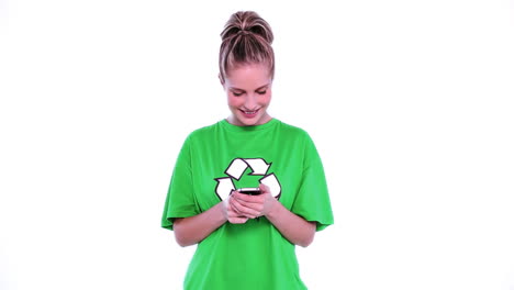 Cheerful-attractive-environmental-activist-using-her-smartphone