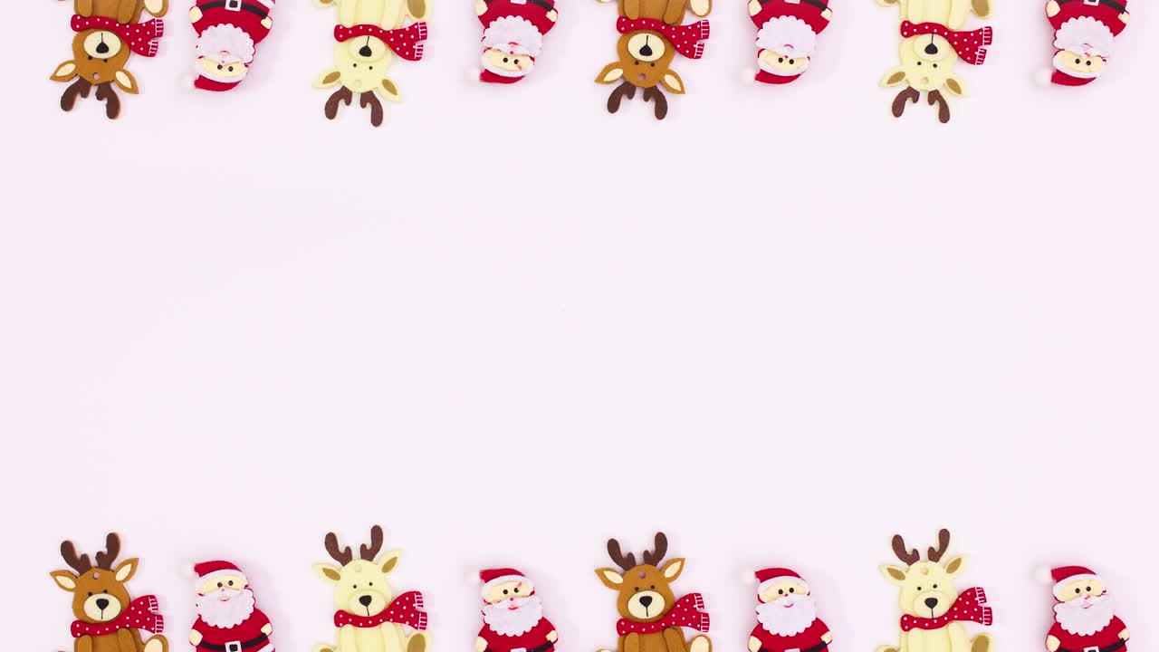 los renos de navidad y santa claus aparecen en la parte superior e inferior del tema blanco.