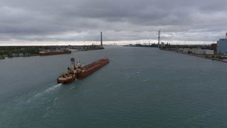 drone view of large tanker in the detroit river in detroit, michigan