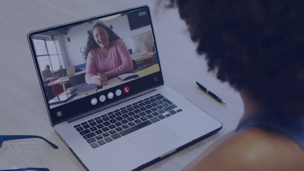 Viewer starting call and tracking technology metrics with animated icons multiplying over laptop