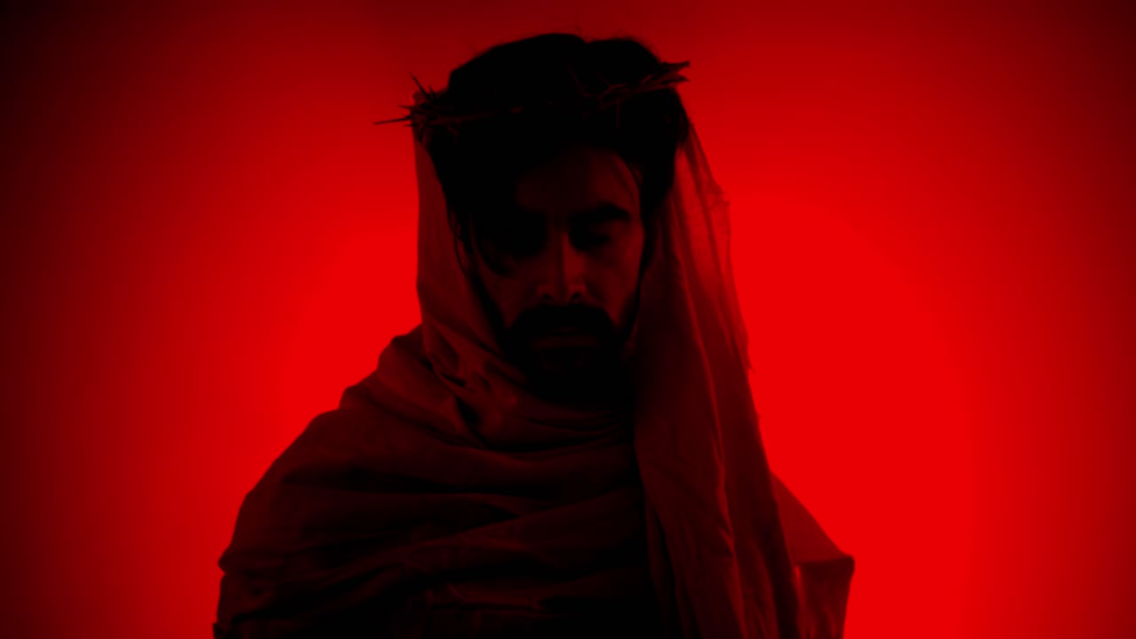 Jesus Christ wearing crown of thorns for Christianity, Easter visual, bible scene or temptation, prayer, worship visual.