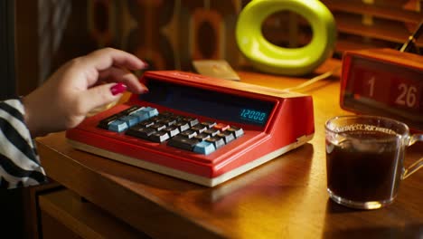 vintage calculator in use