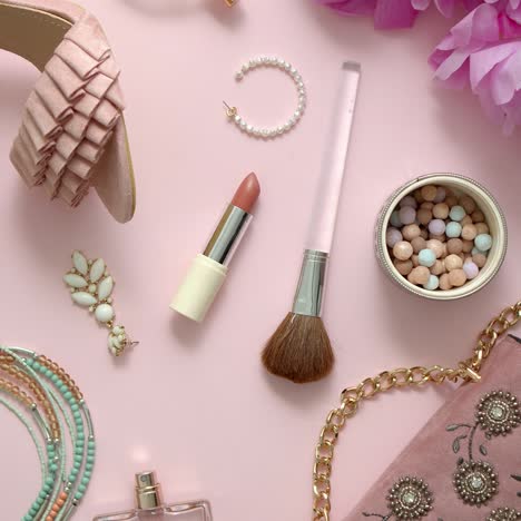 Beauty-and-fashion-accessories-and-gadgets--Femine-concept--Flat-lay-on-pink-theme-background