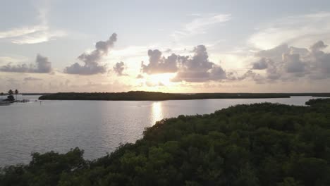 golden dusk sun beam on marshy florida west coast near matlacha