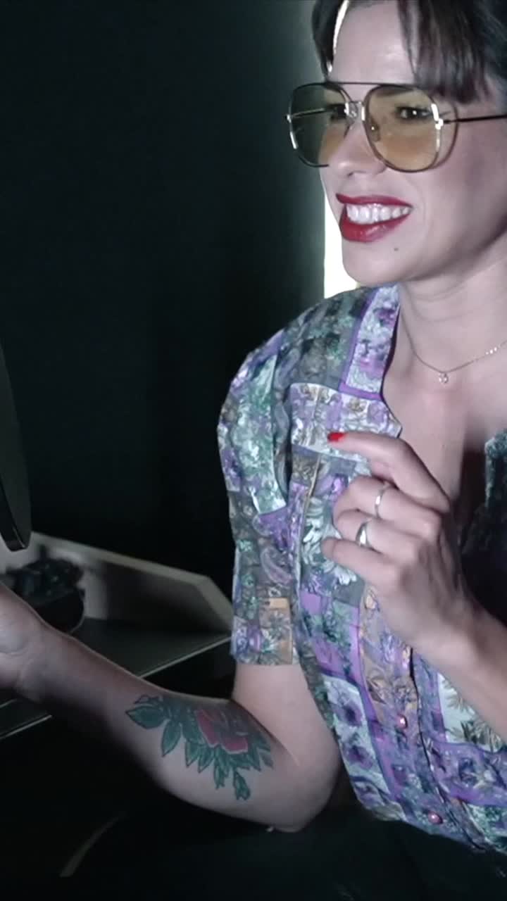 Woman with sunglasses and tattoo