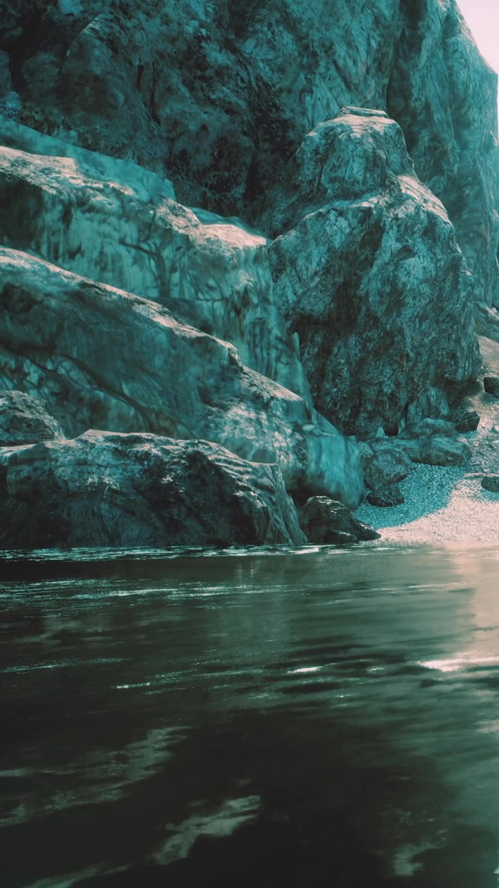 Nature scene with rocks and water at a coastal area during daylight