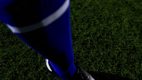 Soccer-player-kicking-the-ball-4k