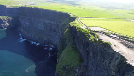 Breathtaking-epic-shot-of-Cliffs-of-Moher-rugged-coastline,-aerial-view,-Ireland