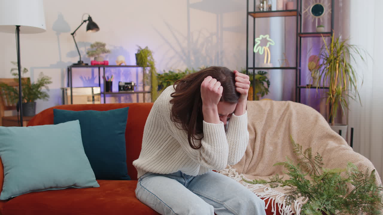 Stressed woman screams from stress tension problems panic horror hopelessness fear surprise shock