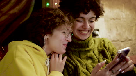 lesbian couple in a bar