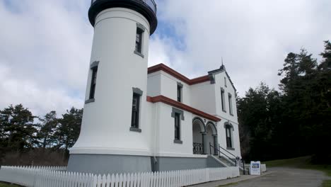 slow motion tilt down of a restored lighthouse at fort casey in washington state