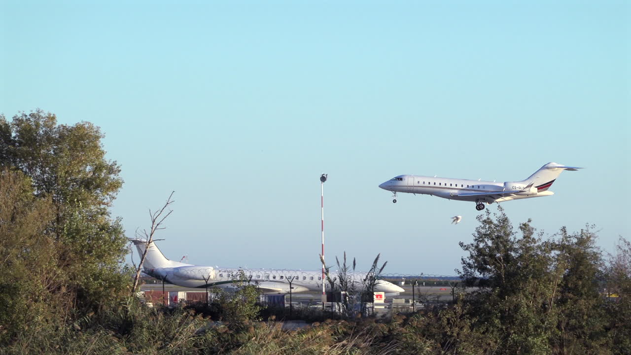 Nice, France - March 20, 2025: View of an airplane landing at the airport