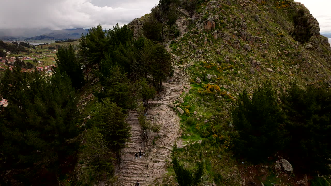 Aerial View Hikers Climbing Cerro Calvario Mountain in Scenic Bolivian Landscape