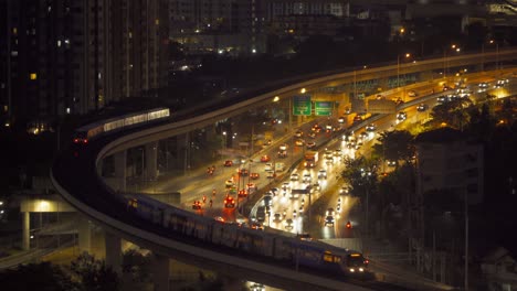 aerial view of highway street road at bangkok downtown skyline, thailand. financial district and business centers in smart urban city in asia.skyscraper and high-rise buildings at night