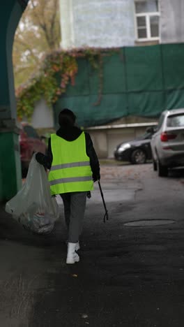 street cleaner in an alley