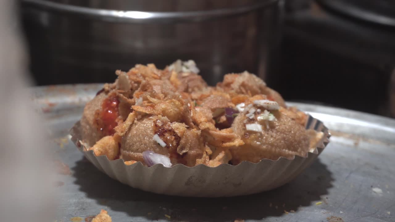 sev puri indian street food making closeup view